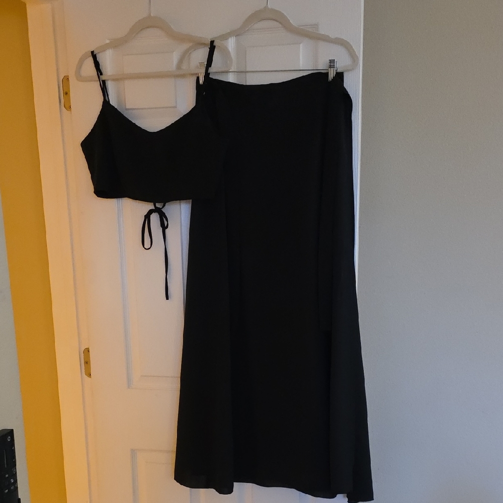 Stylish Black Two-Piece Set with Crop Top and Wrap Skirt
